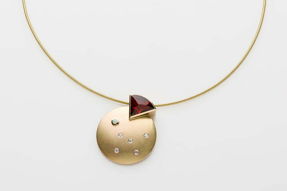 Montreal Jewelry Photography - Golden red stone necklace designed by Petra Luz