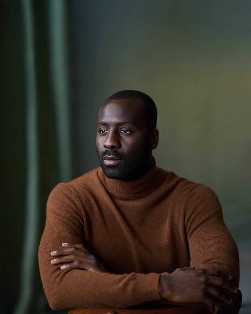 Montreal-actor-headshot-dark-skin-green-curtain-canvas-lowkey-by-nadiazheng