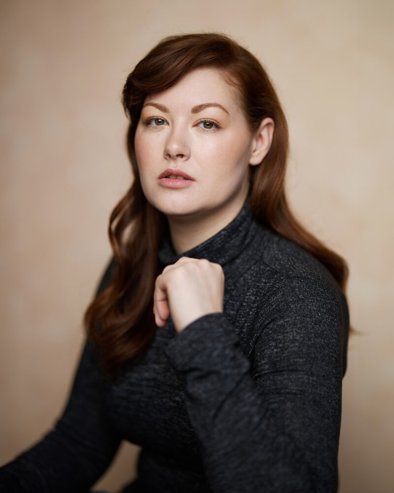 Montreal-actress-singer-headshot-turtle-neck-beige-canvas-background-by-nadia-zheng