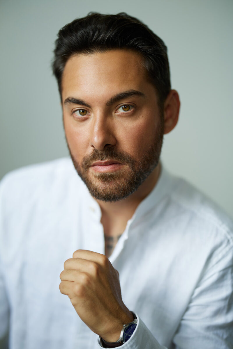 Montreal-actors-headshot-white-shirt-serious-look