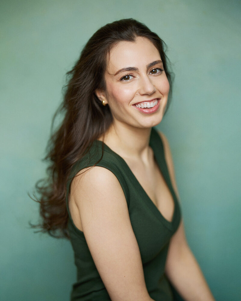 Montreal-actress-casting-headshot-green-top-long-hair-smily-by-nadia-zheng