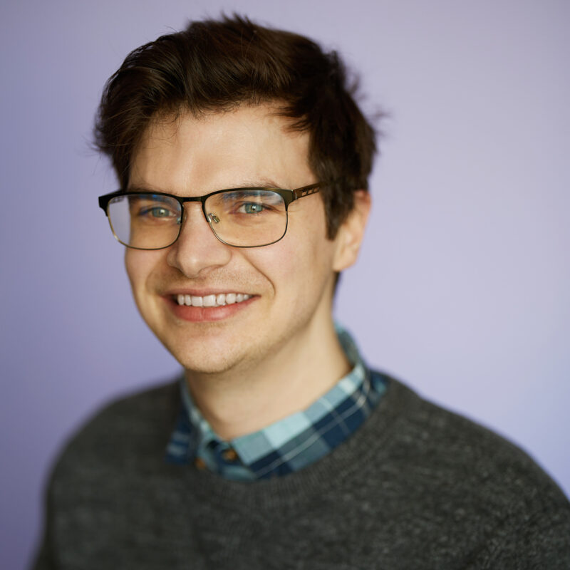 Montreal-team-business-casual-corporate-headshots-natural-light-purple-background-09