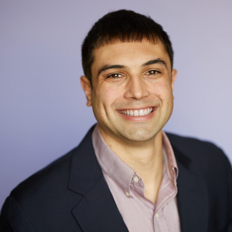 Montreal-team-business-casual-corporate-headshots-natural-light-purple-background-11