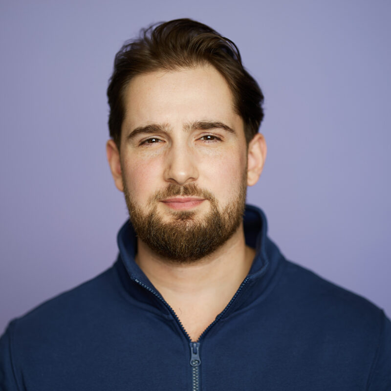 Montreal-team-business-casual-corporate-headshots-natural-light-purple-background-13