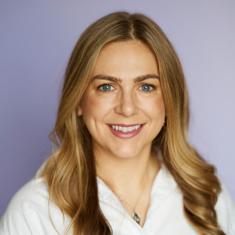 Montreal-team-business-casual-corporate-headshots-natural-light-purple-background-18