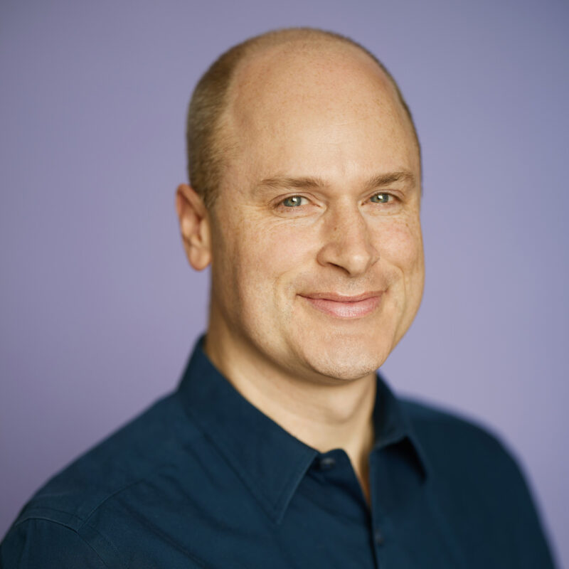 Montreal-team-business-casual-corporate-headshots-natural-light-purple-background-27