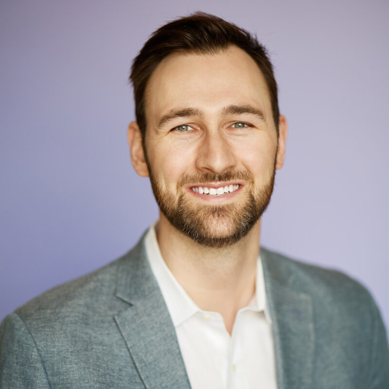 Montreal-team-business-casual-corporate-headshots-natural-light-purple-background-34